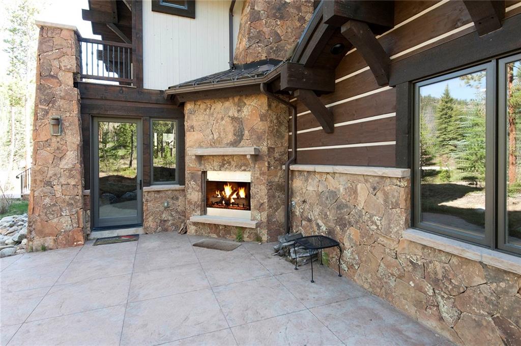 10 Wolf Rock Road Keystone, CO 80435 - Photo 20 of 25 a living room with furniture a window and fireplace