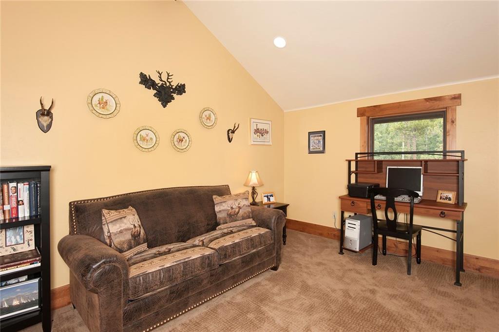 10 Wolf Rock Road Keystone, CO 80435 - Photo 21 of 25 a living room with furniture and a window