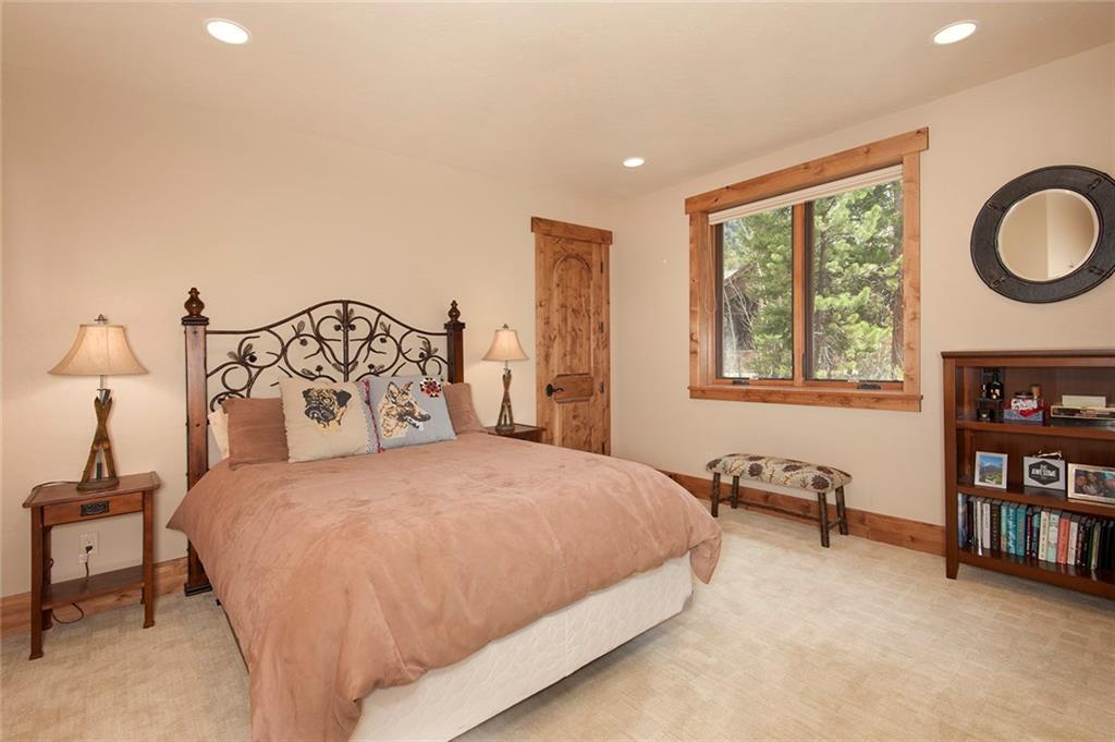 10 Wolf Rock Road Keystone, CO 80435 - Photo 22 of 25 a bedroom with a bed furniture and a window