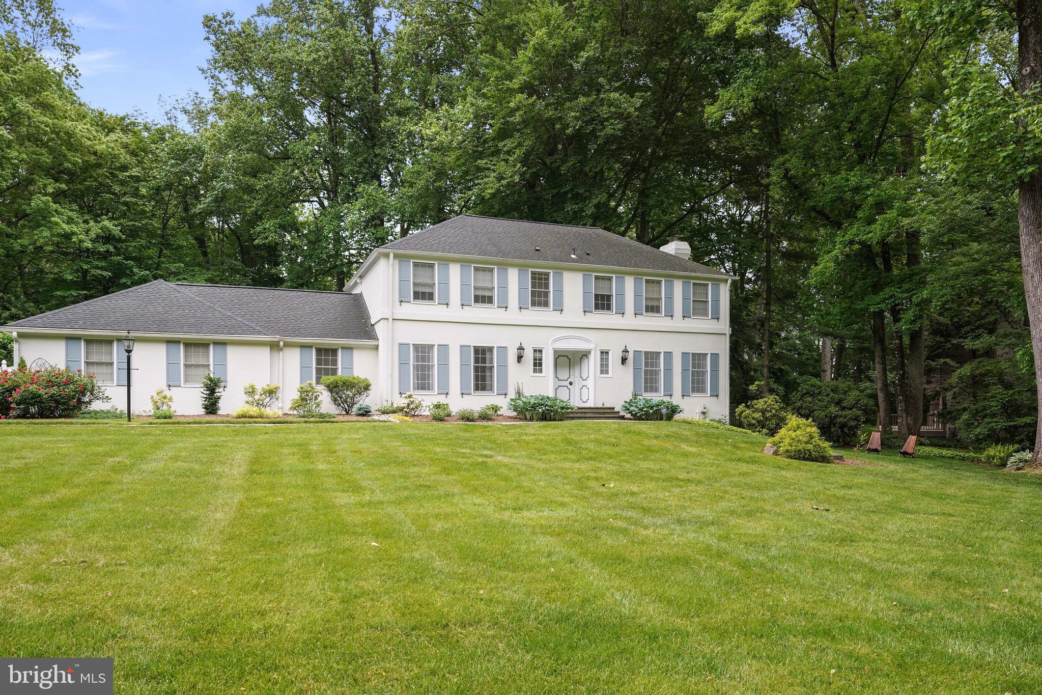 741 Campwoods Road Villanova, PA 19085 - Photo 2 of 48 a front view of a house with a garden