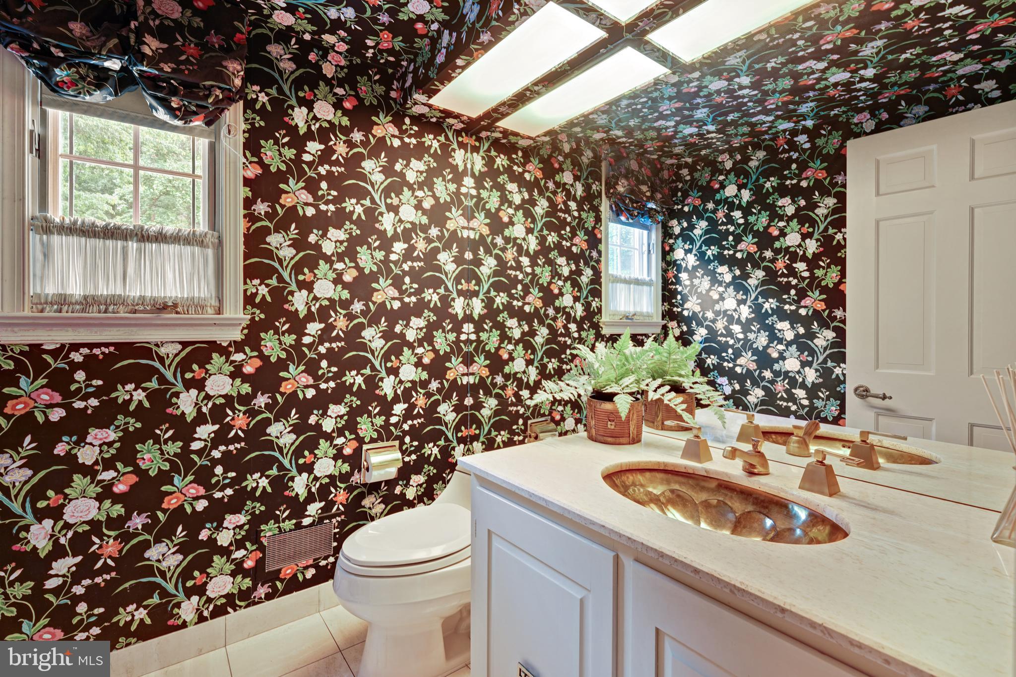 741 Campwoods Road Villanova, PA 19085 - Photo 11 of 48 a bathroom with a sink toilet and window