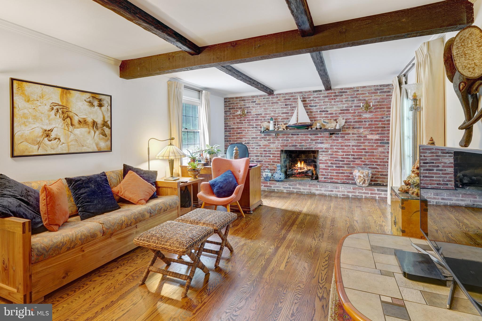 741 Campwoods Road Villanova, PA 19085 - Photo 21 of 48 a living room with furniture and a fireplace