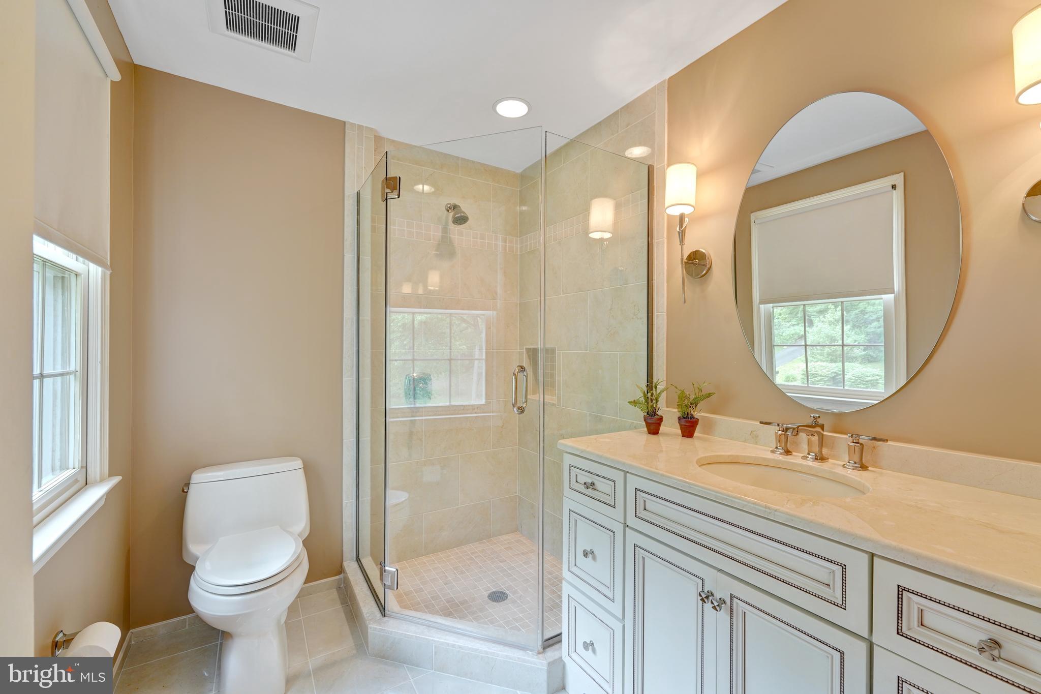 741 Campwoods Road Villanova, PA 19085 - Photo 25 of 48 a bathroom with a toilet sink and mirror