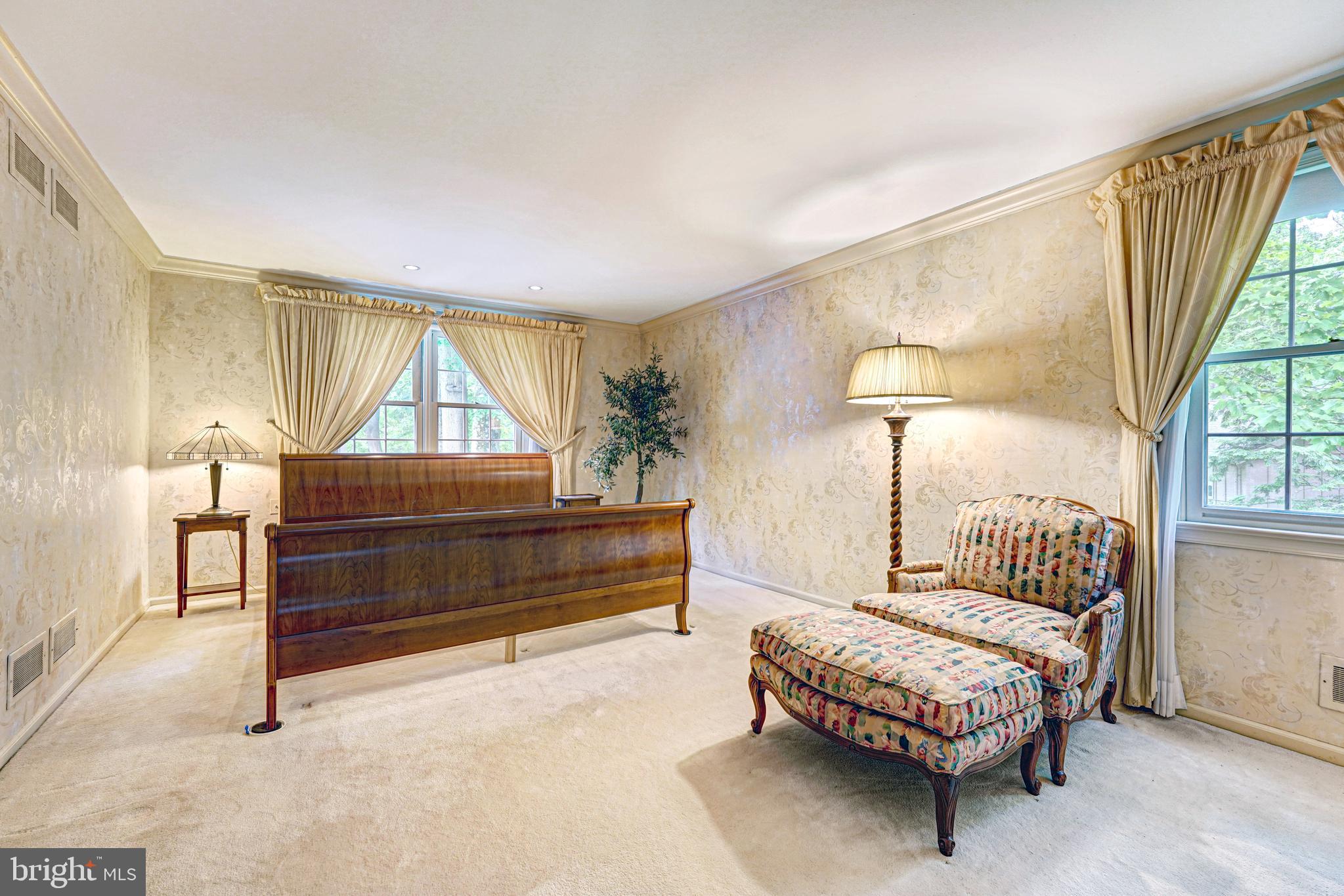 741 Campwoods Road Villanova, PA 19085 - Photo 28 of 48 a bedroom with a bed mirror and a window