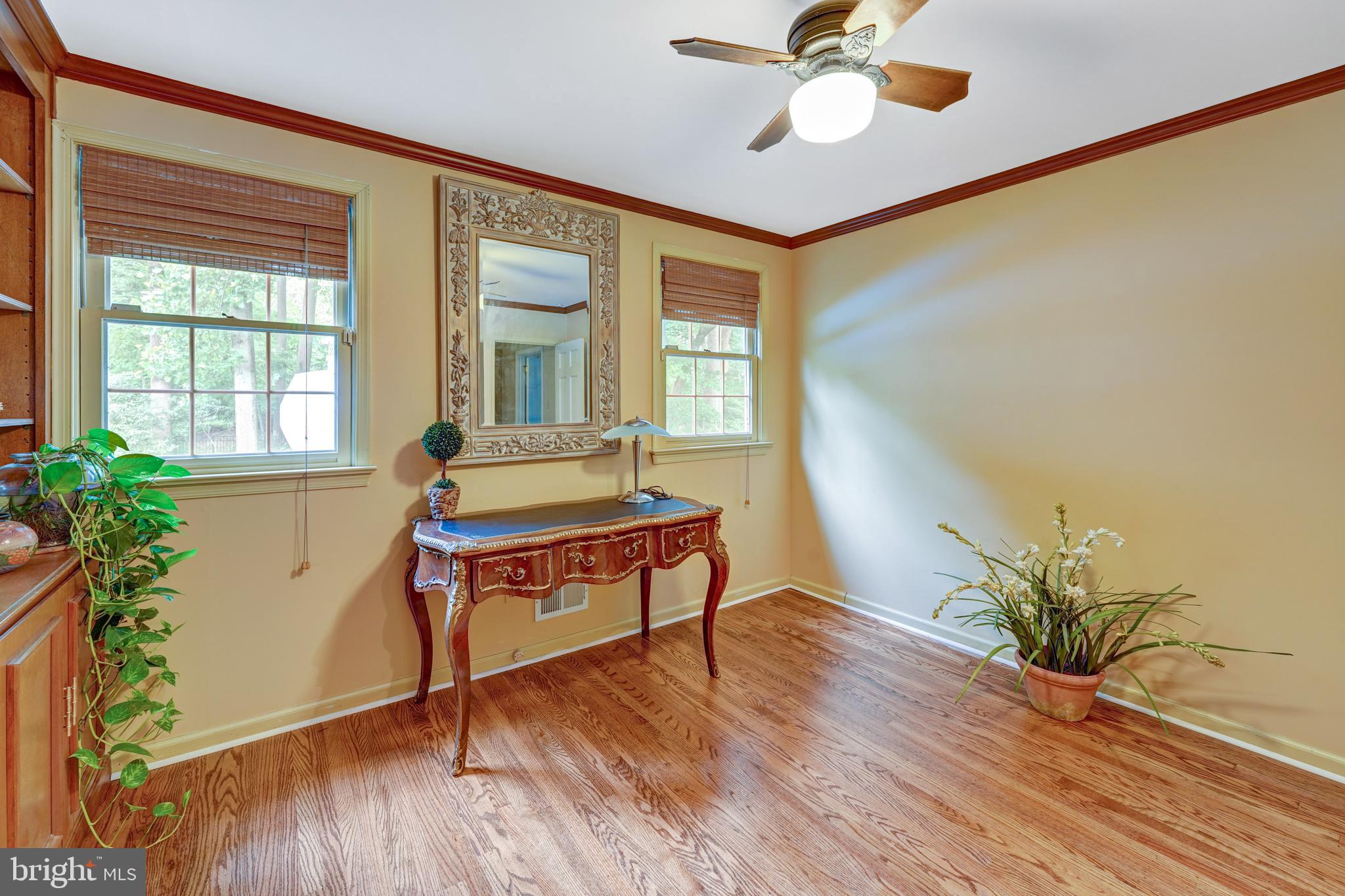 741 Campwoods Road Villanova, PA 19085 - Photo 37 of 48 a living room with furniture and a potted plant