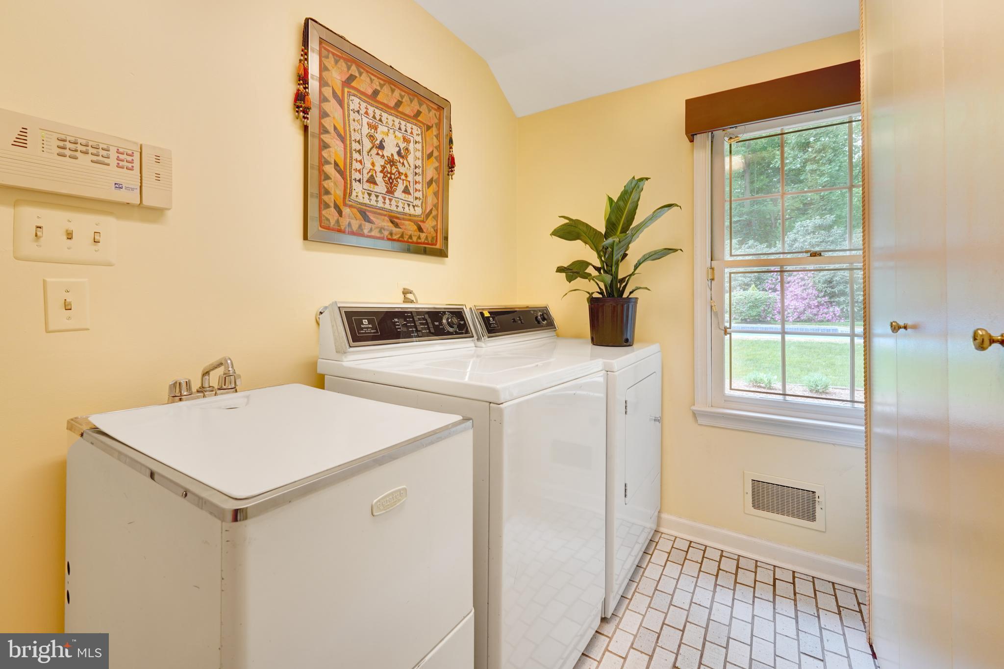 741 Campwoods Road Villanova, PA 19085 - Photo 39 of 48 a utility room with dryer and washer