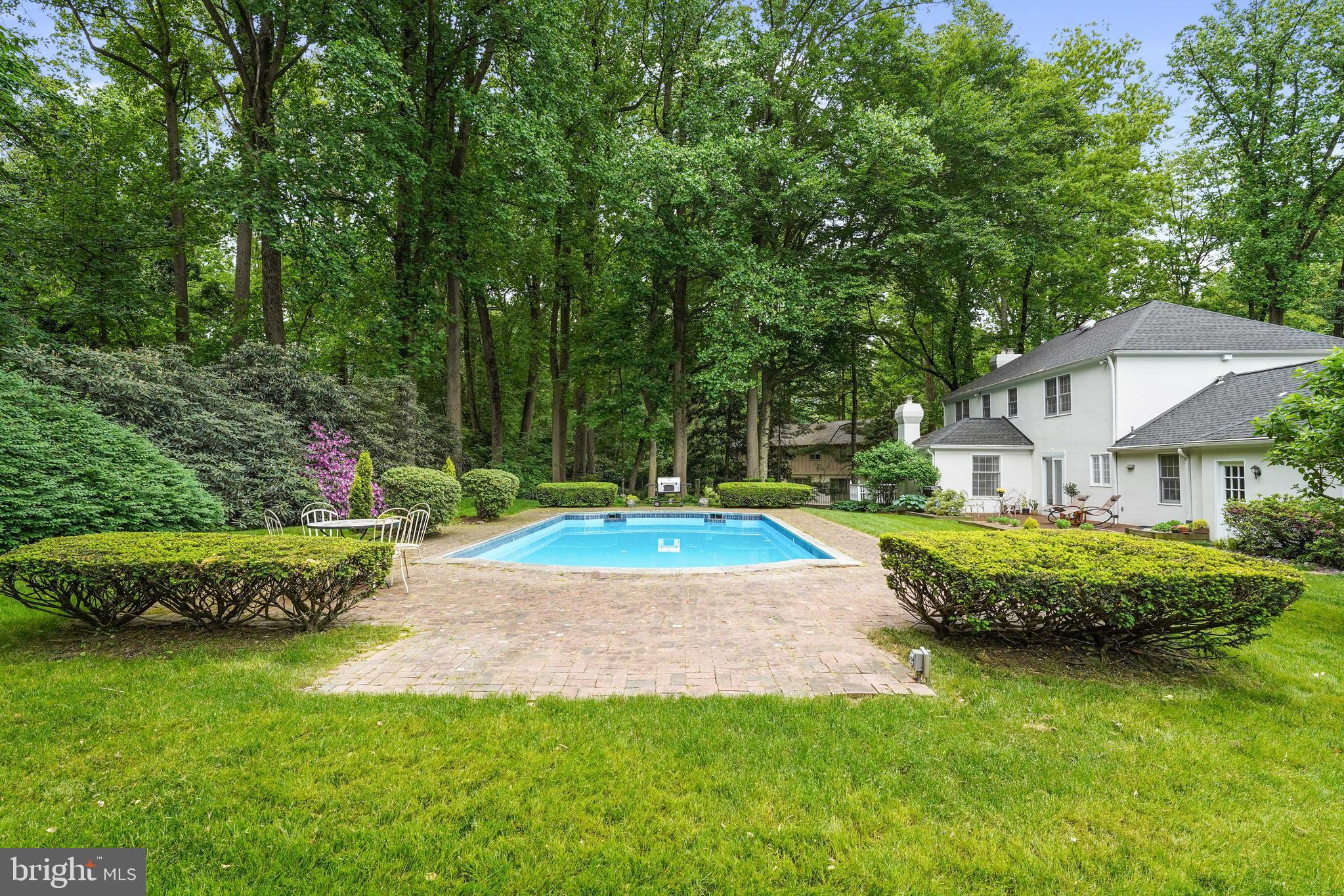 741 Campwoods Road Villanova, PA 19085 - Photo 45 of 48 a view of backyard with swimming pool and green space