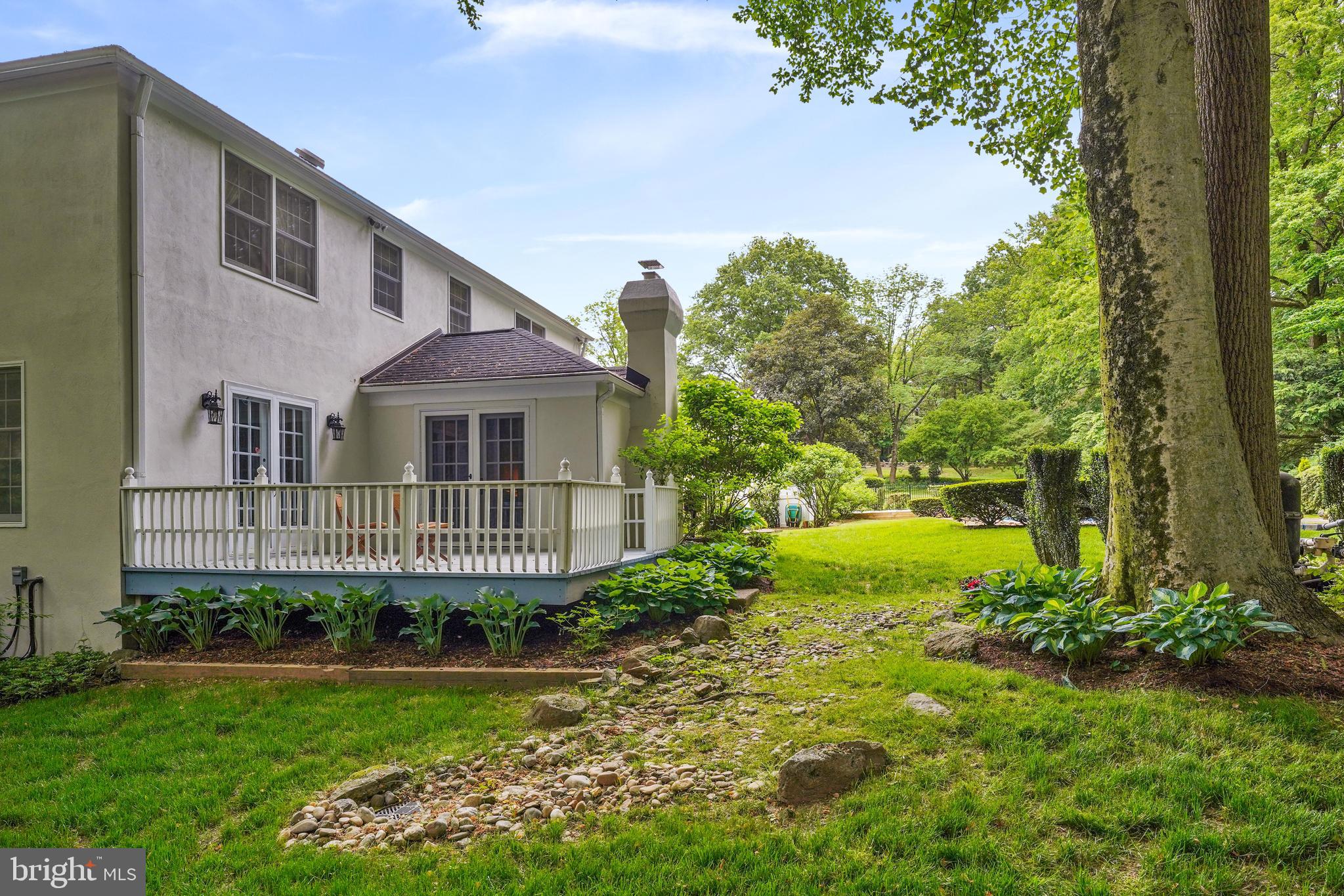 741 Campwoods Road Villanova, PA 19085 - Photo 48 of 48 a front view of a house with garden
