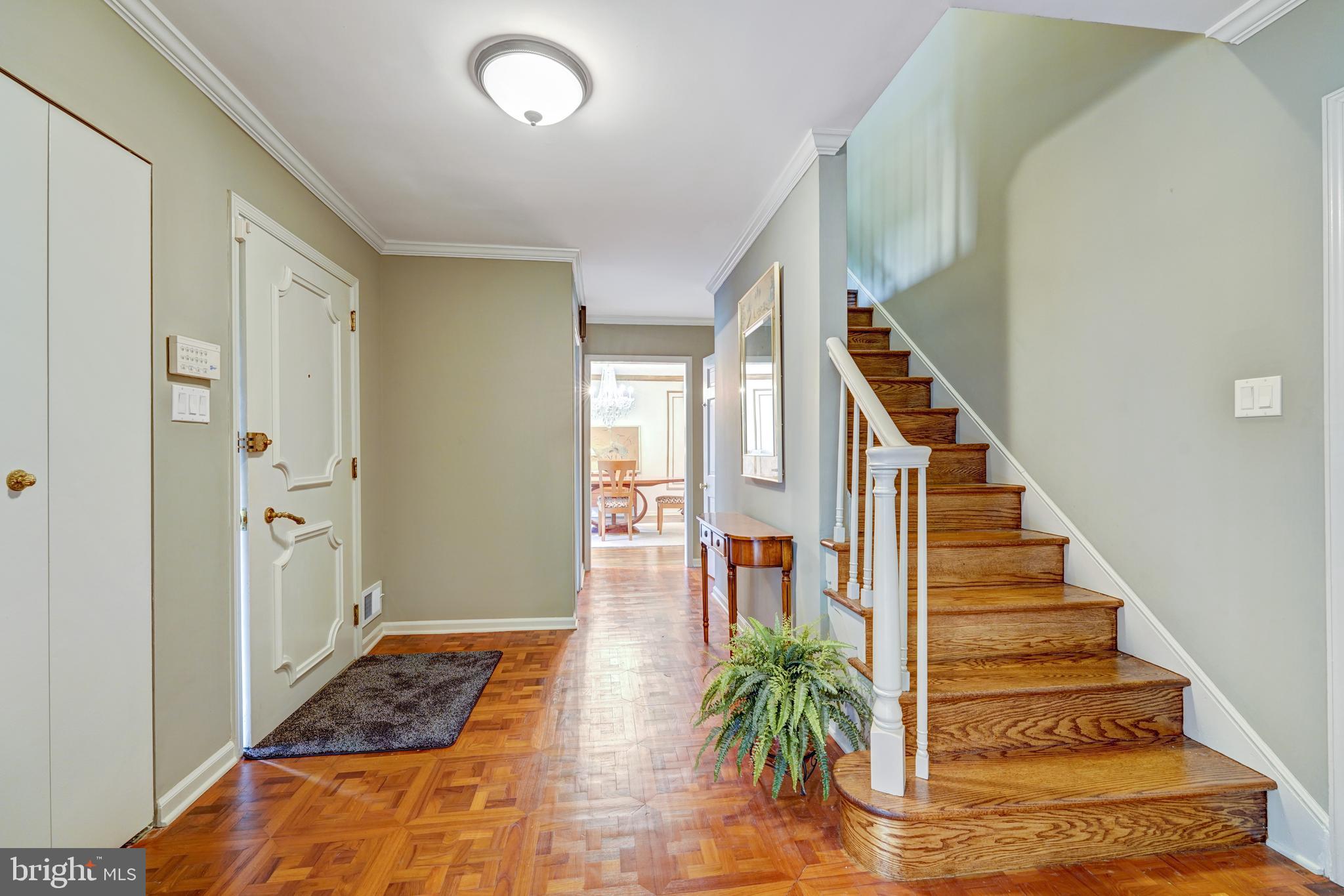 741 Campwoods Road Villanova, PA 19085 - Photo 9 of 48 a view of entryway with wooden floor and stairs