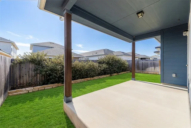 a view of a backyard with garden