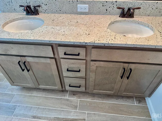 a bathroom with a bathtub and a window