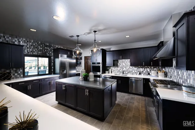 a dining room with furniture a rug and a chandelier