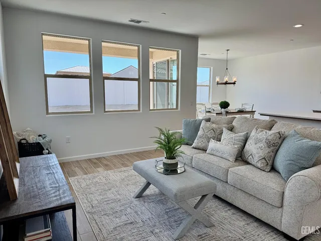 a living room with furniture and window