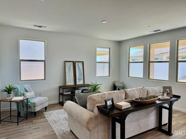 a living room with furniture and window