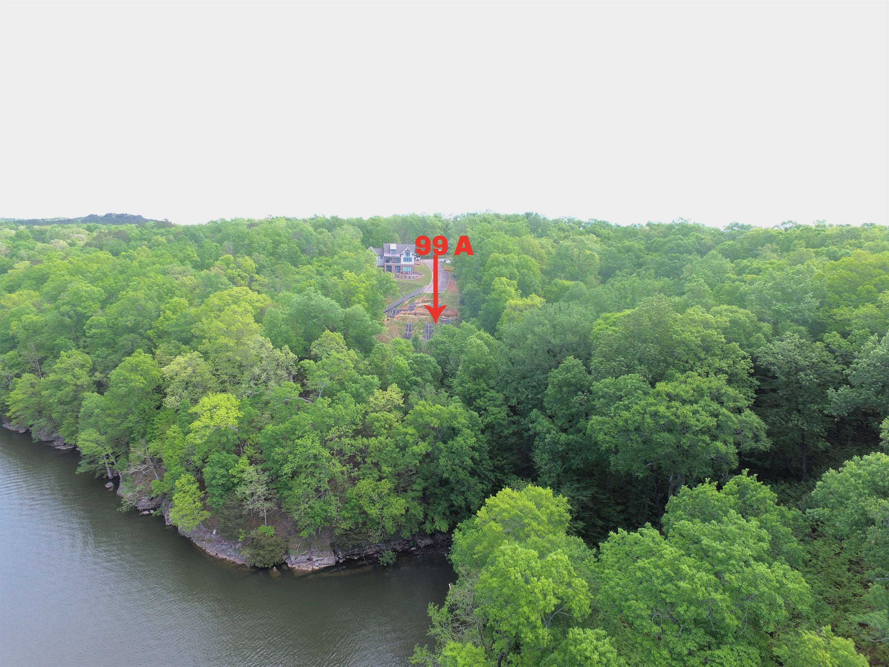 115 Gentle Rdg Way Savannah, TN 38372 - Photo 3 of 8 an aerial view of a house with a yard basket ball court and outdoor seating