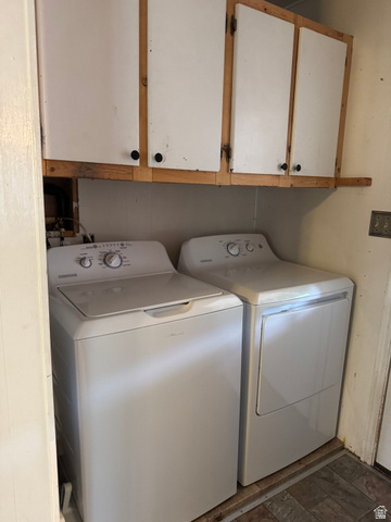 210 South State Street Moroni, UT 84646 - Photo 7 of 23 Dedicated laundry area featuring white upper cabinetry with wood trim and a tiled flooring surface