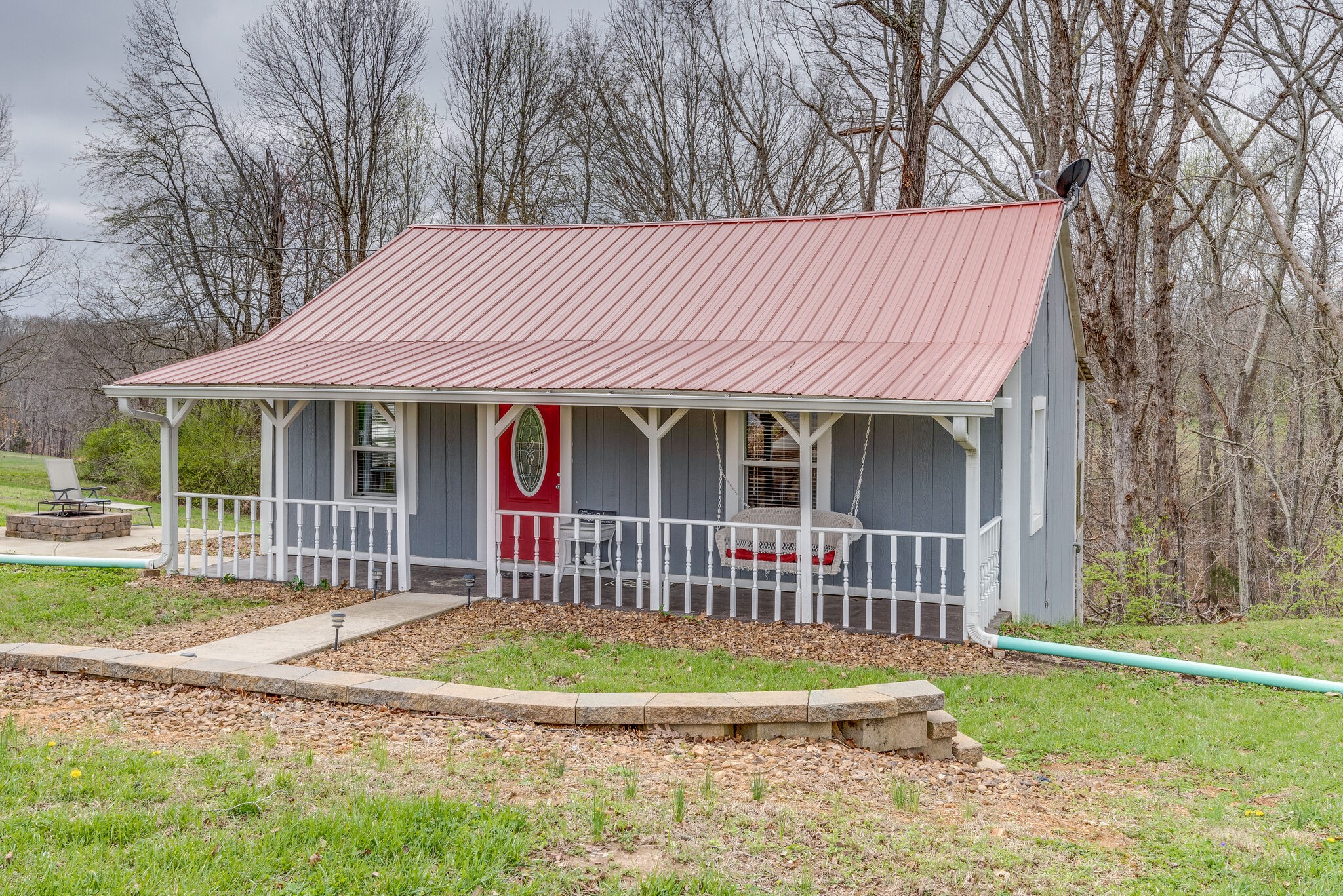 7606 Pewitt Road Franklin, TN 37064 - Photo 1 of 28 a front view of a house with garden