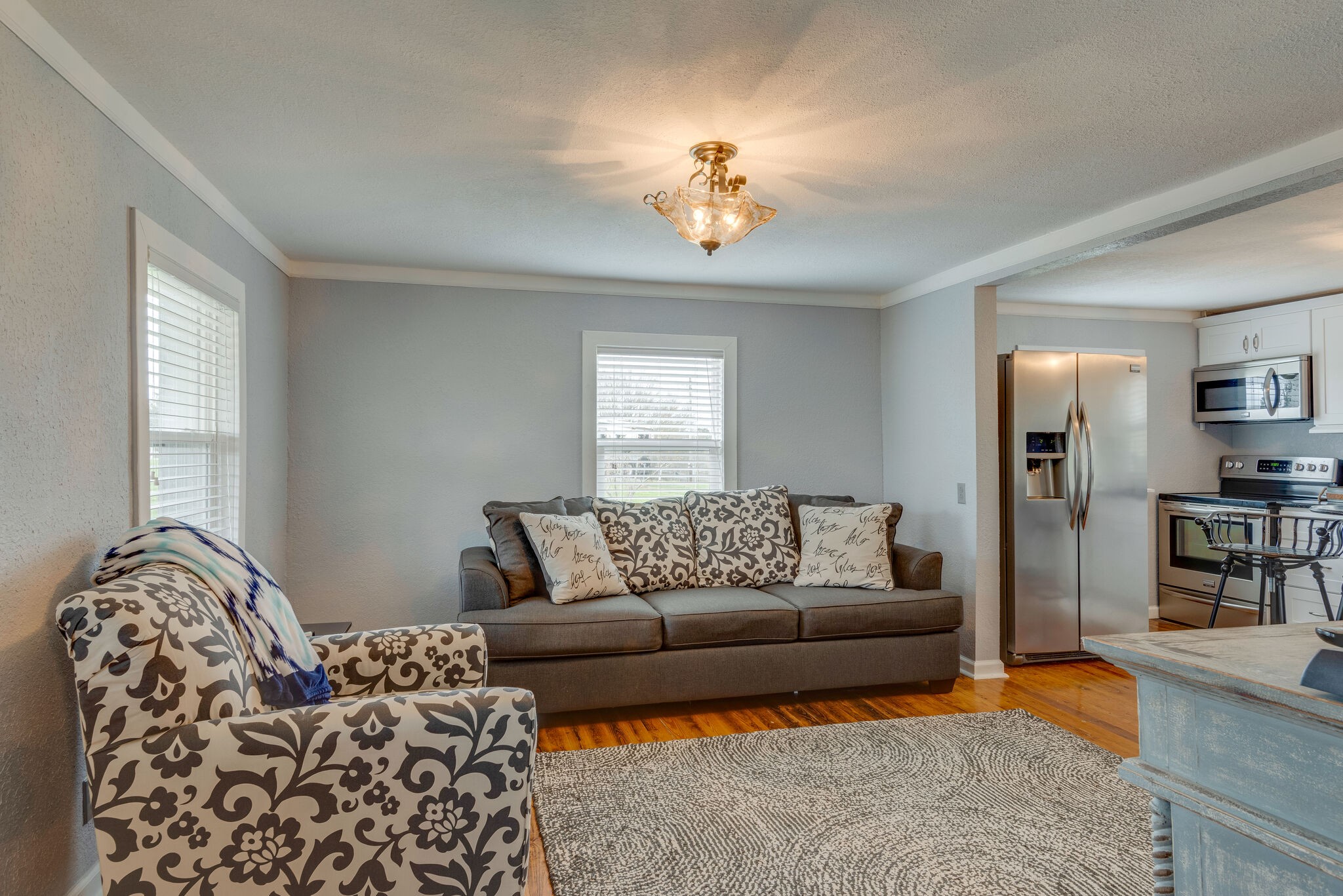 7606 Pewitt Road Franklin, TN 37064 - Photo 7 of 28 a living room with furniture and a couch