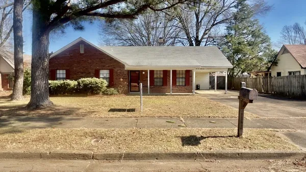 a front view of house with yard