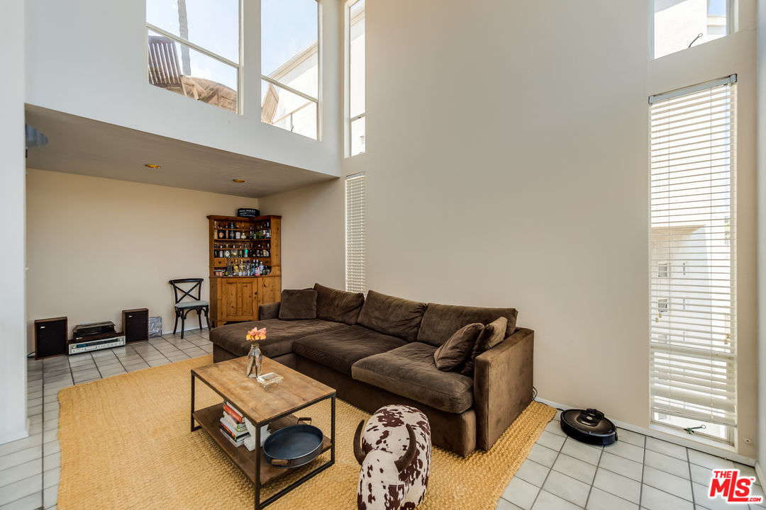 114 Fleet Street Marina del Rey, CA 90292 - Photo 2 of 19 a living room with furniture and a window