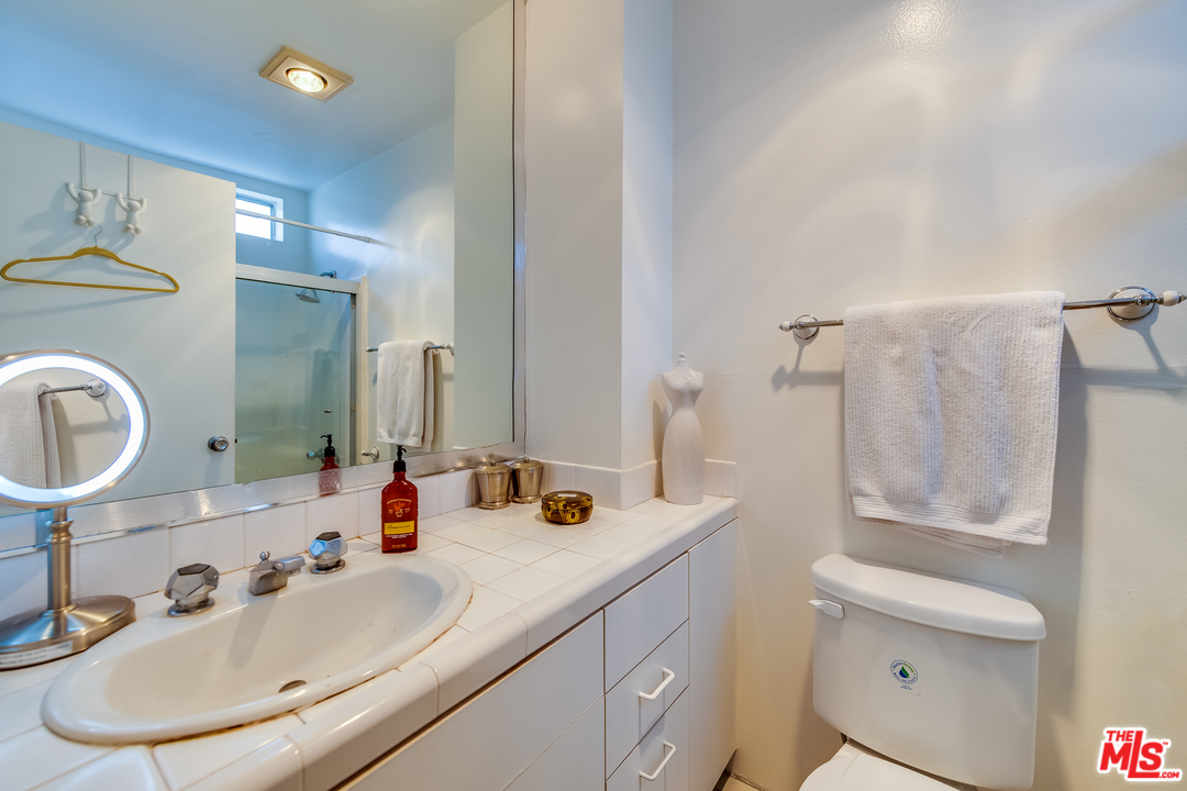 114 Fleet Street Marina del Rey, CA 90292 - Photo 12 of 19 a bathroom with a sink double vanity and a mirror