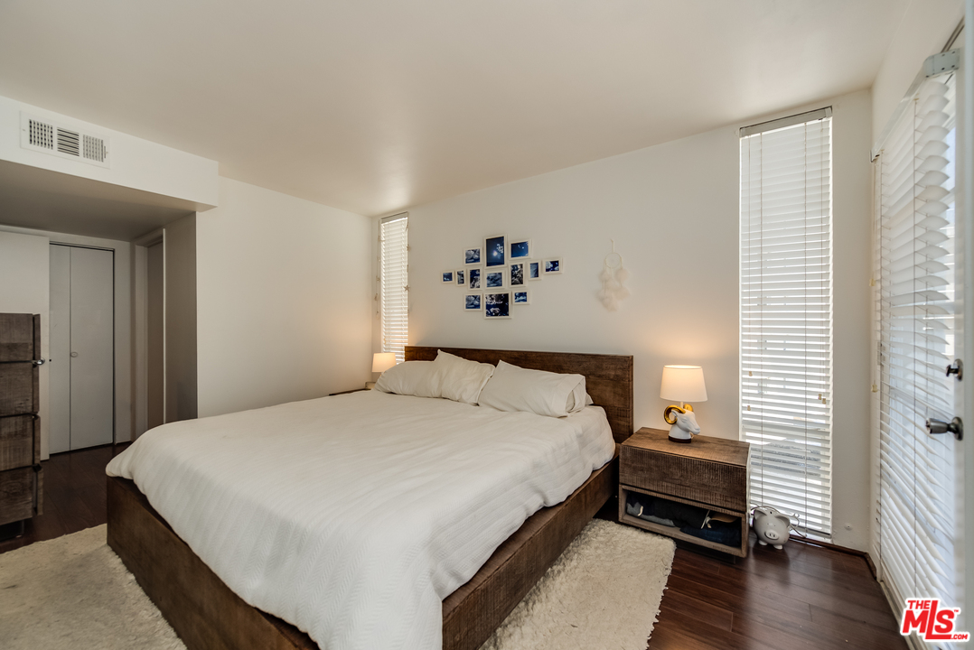 114 Fleet Street Marina del Rey, CA 90292 - Photo 13 of 19 a bedroom with a bed and a window
