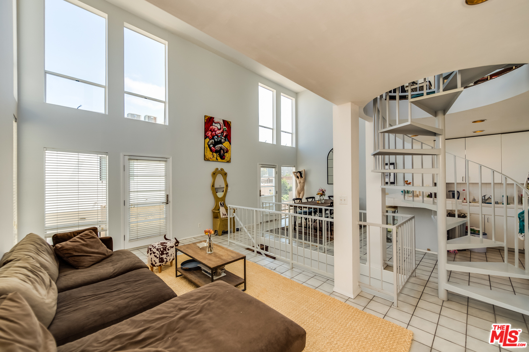 114 Fleet Street Marina del Rey, CA 90292 - Photo 4 of 19 a living room with furniture and a table