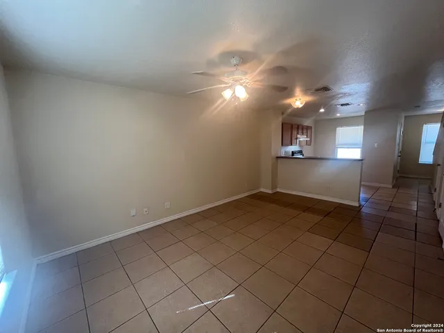 a white toilet sitting in a bathroom