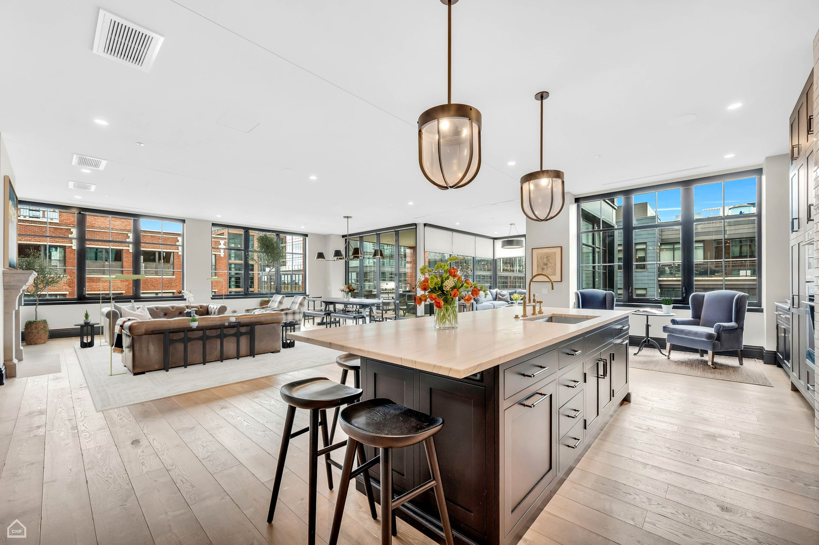 1109 West Washington Boulevard, Unit 6B Chicago, IL 60607 - Photo 11 of 40 a large kitchen with a counter space a stove and furniture