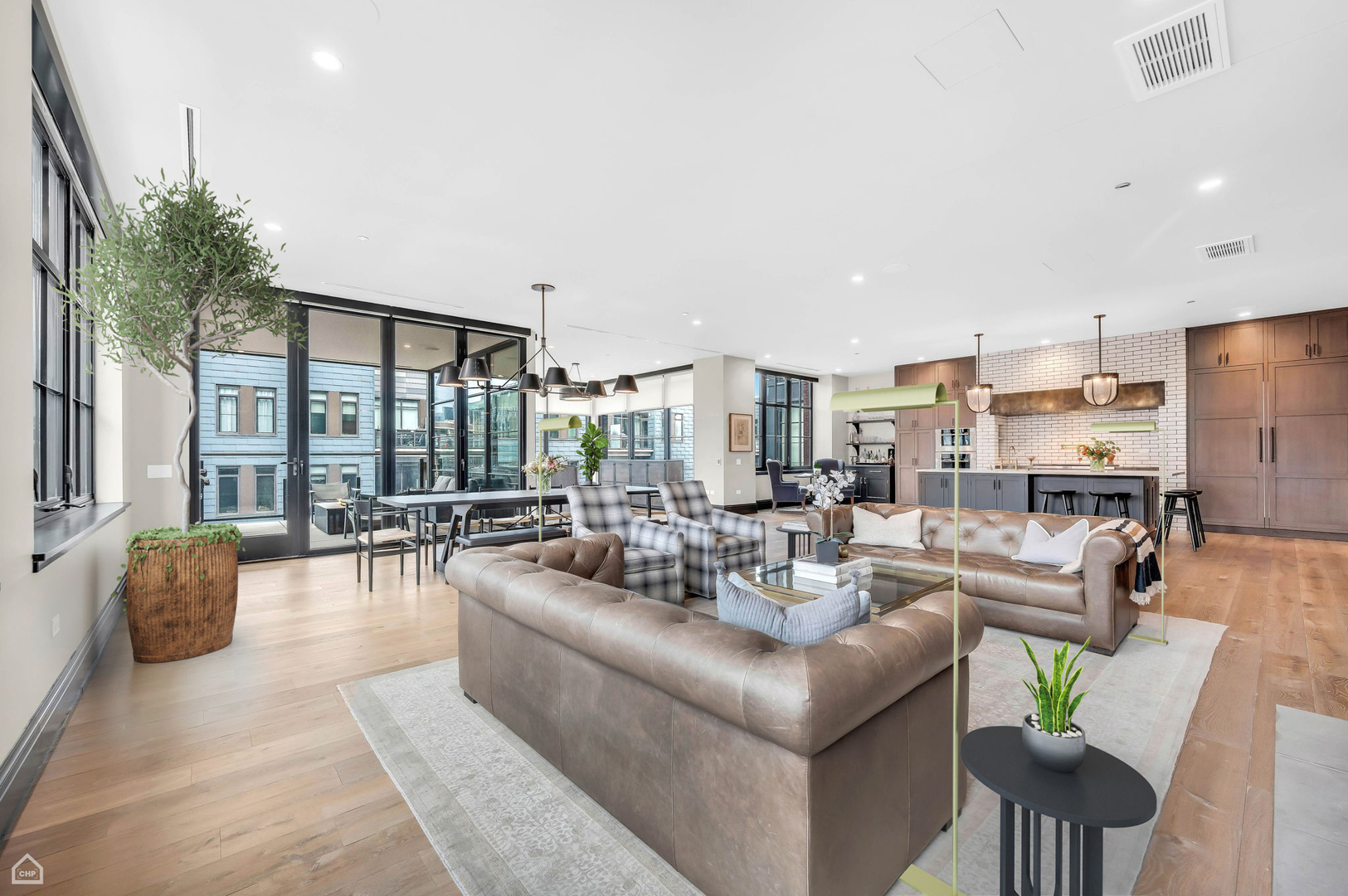 1109 West Washington Boulevard, Unit 6B Chicago, IL 60607 - Photo 15 of 40 a living room with furniture and a large window