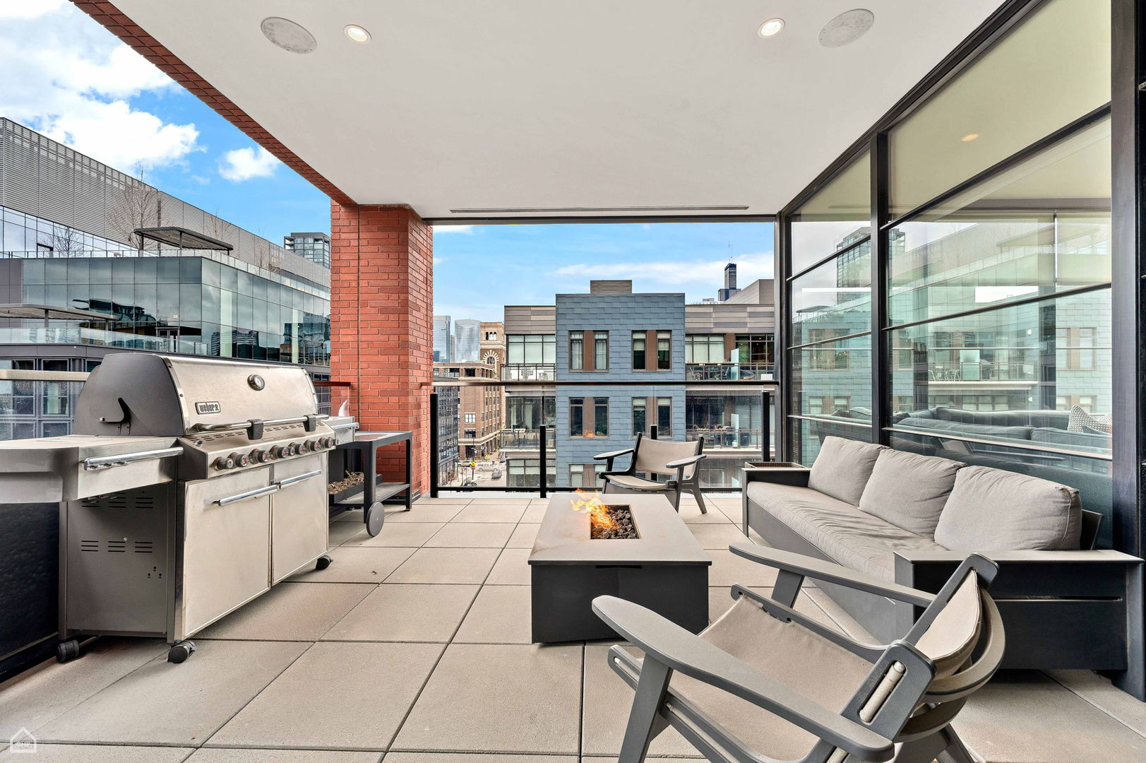 1109 West Washington Boulevard, Unit 6B Chicago, IL 60607 - Photo 20 of 40 a living room with stainless steel appliances furniture a rug and a large window
