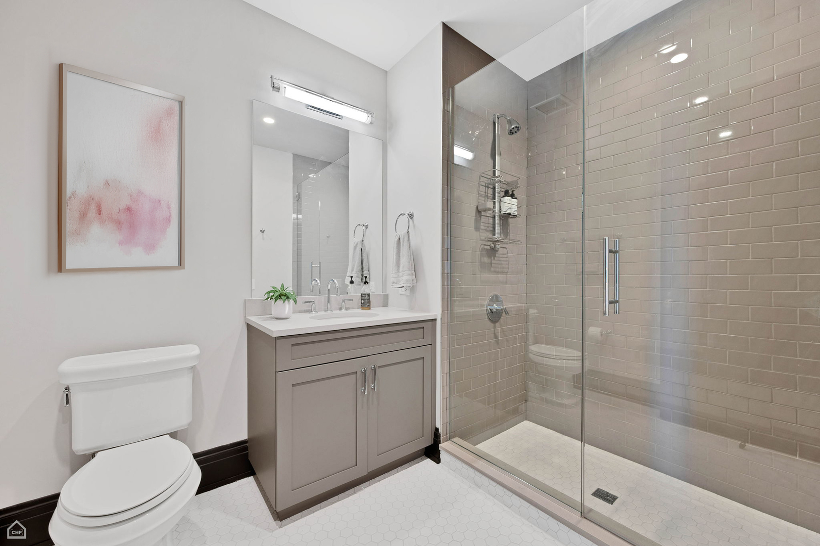 1109 West Washington Boulevard, Unit 6B Chicago, IL 60607 - Photo 34 of 40 a bathroom with a toilet sink and shower