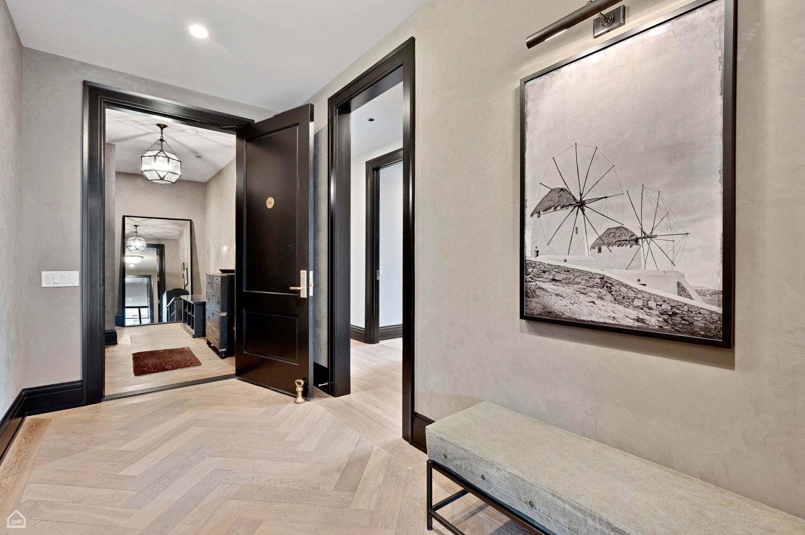 1109 West Washington Boulevard, Unit 6B Chicago, IL 60607 - Photo 38 of 40 a bedroom with a bed and a painting on the wall