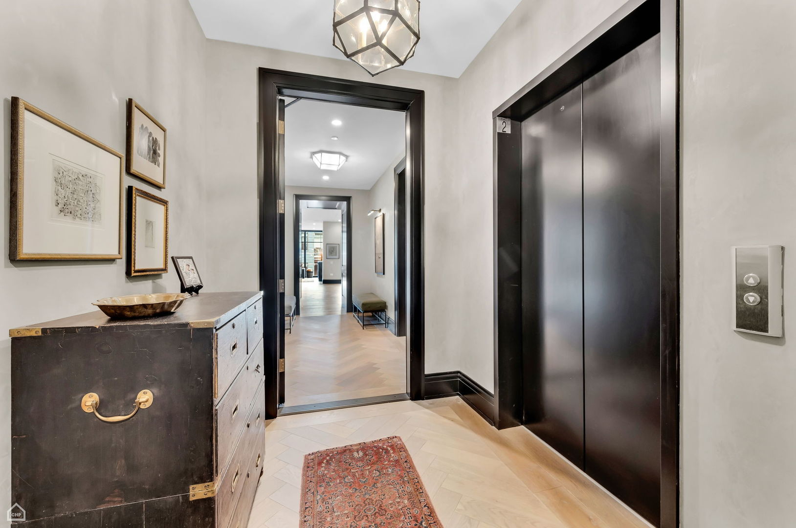 1109 West Washington Boulevard, Unit 6B Chicago, IL 60607 - Photo 5 of 40 a view of a hallway with wooden floor and staircase