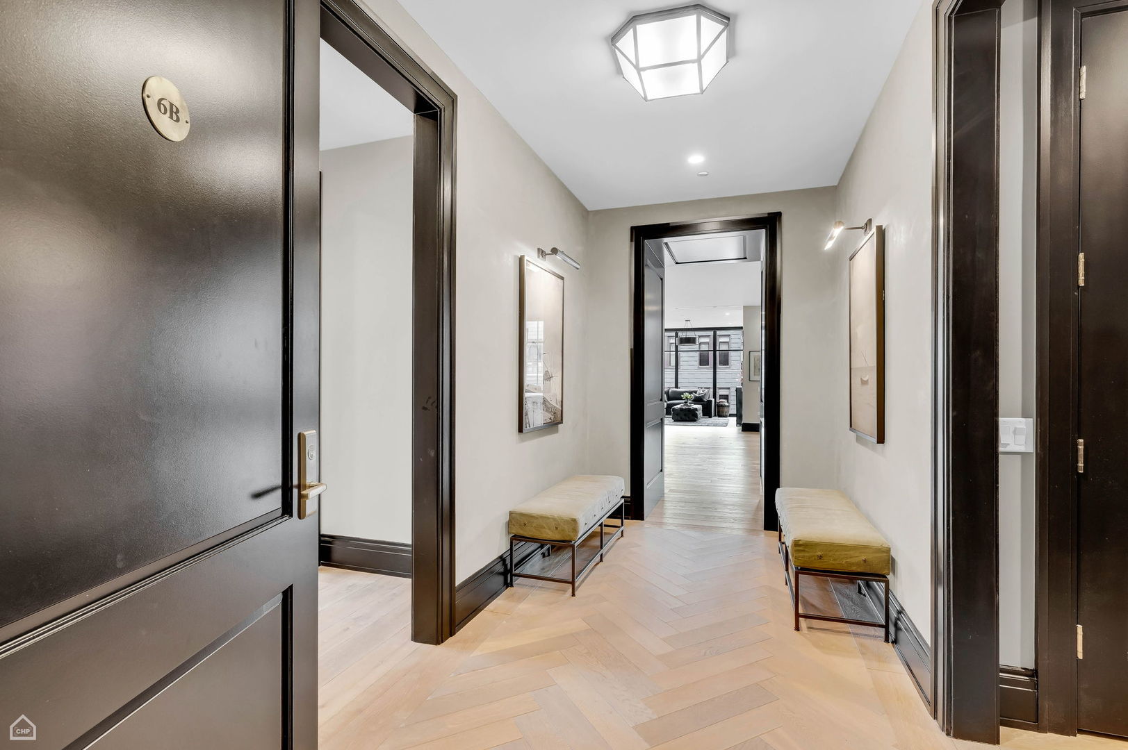 1109 West Washington Boulevard, Unit 6B Chicago, IL 60607 - Photo 6 of 40 a hallway with table and chairs