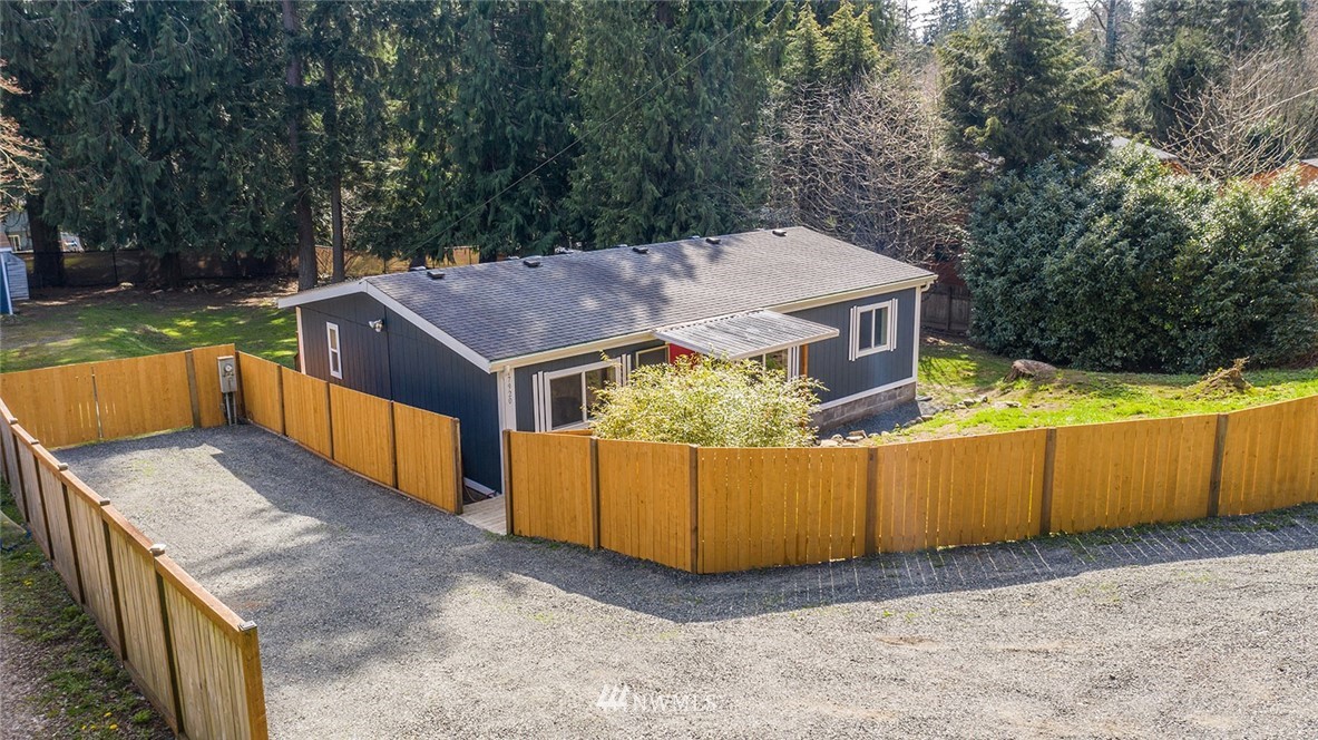 17920 Trombley Road Snohomish, WA 98290 - Photo 2 of 36 a view of a backyard with wooden fence