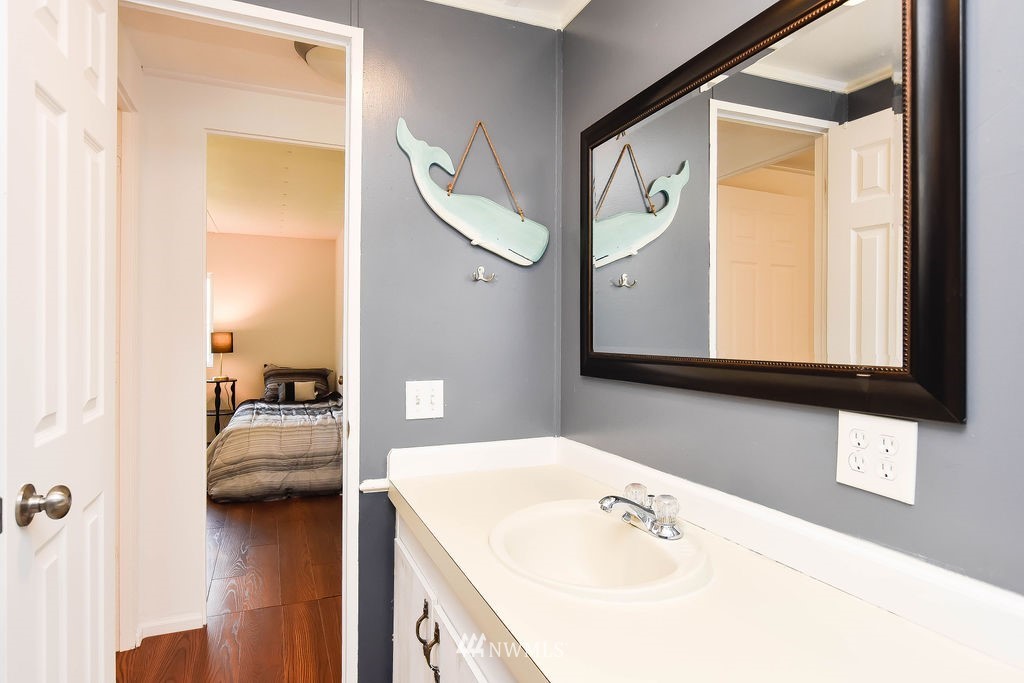17920 Trombley Road Snohomish, WA 98290 - Photo 19 of 36 a en suite bathroom with a sink and a mirror