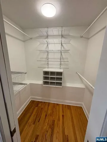 a view of wooden floor in an empty room