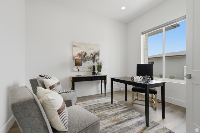 653 East Vandalay Lane Draper, UT 84020 - Photo 5 of 61 Bright room featuring wood-finish flooring, recessed lighting, and a large window