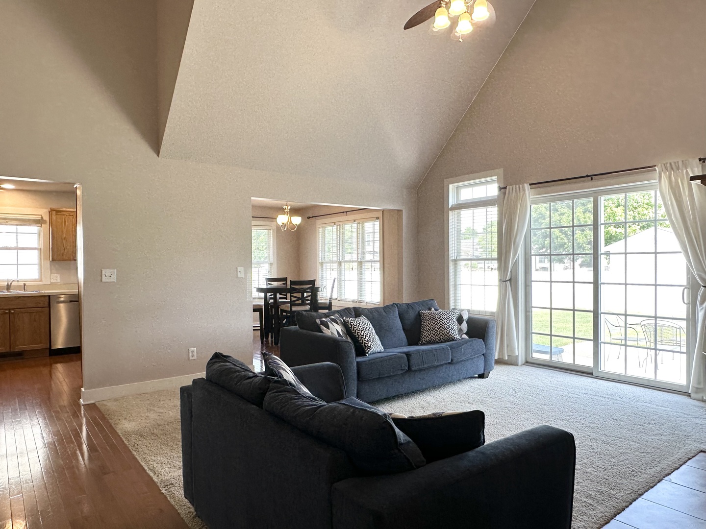 1205 Eagle Bluff Drive Bourbonnais, IL 60914 - Photo 15 of 51 a living room with furniture and a large window