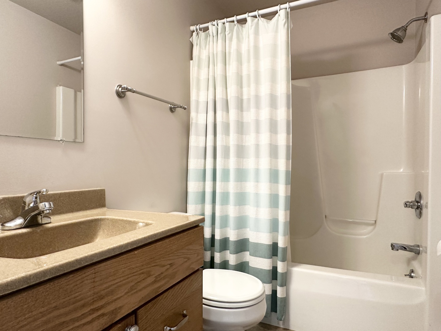 1205 Eagle Bluff Drive Bourbonnais, IL 60914 - Photo 29 of 51 a bathroom with a sink a toilet a mirror and a shower