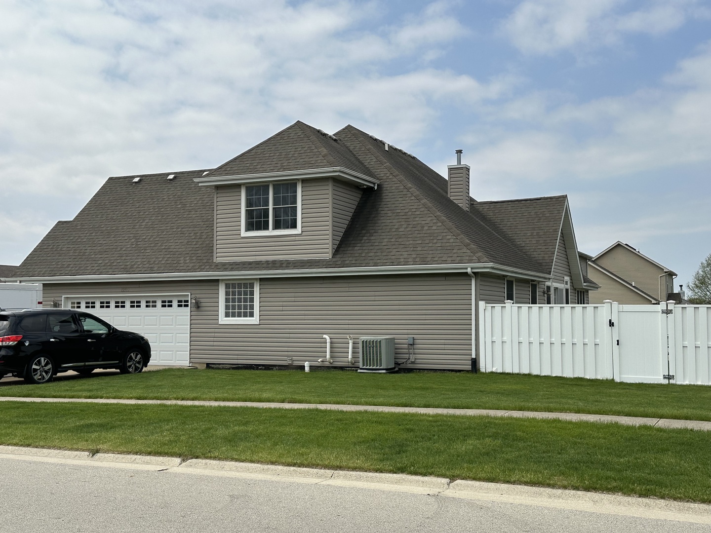 1205 Eagle Bluff Drive Bourbonnais, IL 60914 - Photo 44 of 51 a front view of a house with a garden