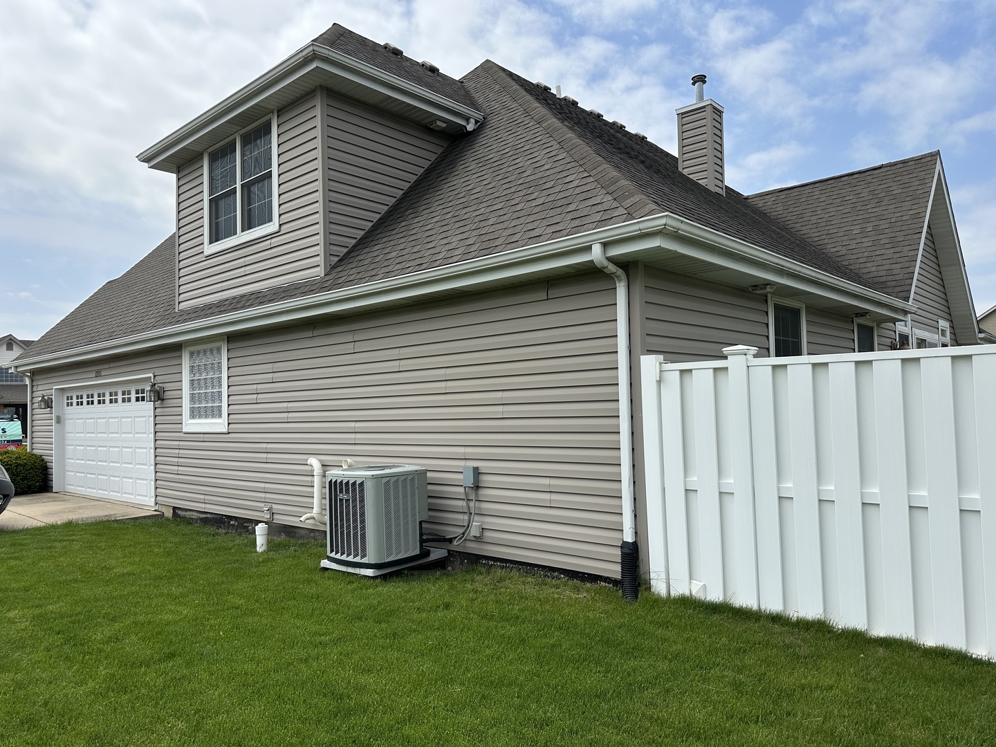 1205 Eagle Bluff Drive Bourbonnais, IL 60914 - Photo 45 of 51 a front view of a house with a garden