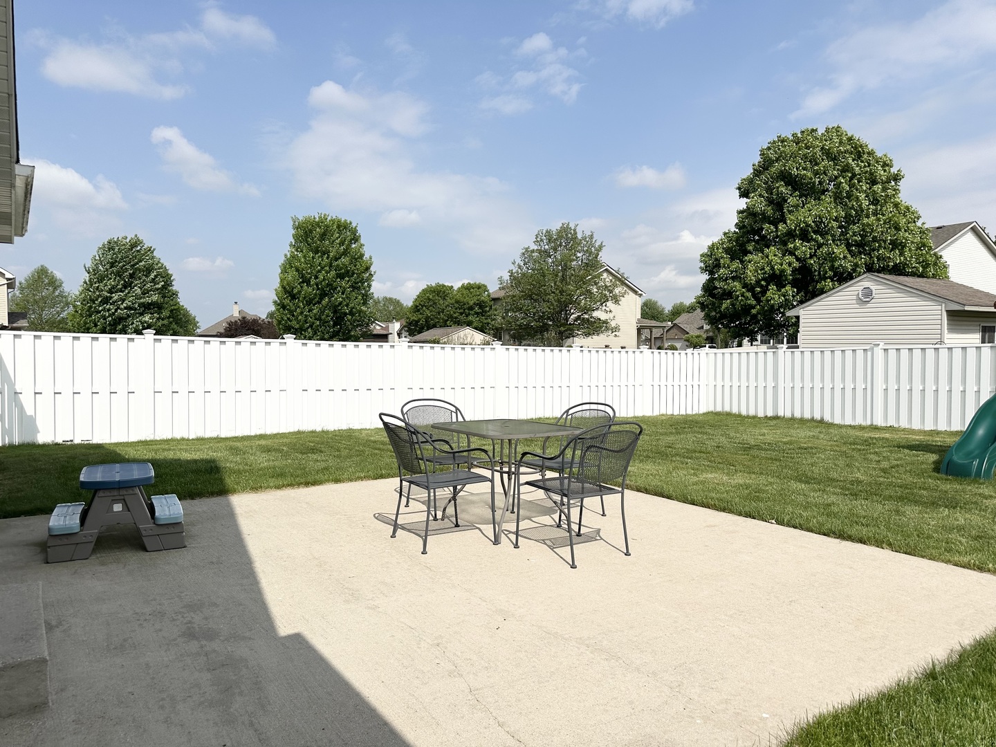 1205 Eagle Bluff Drive Bourbonnais, IL 60914 - Photo 47 of 51 a view of a chairs and table in the back yard