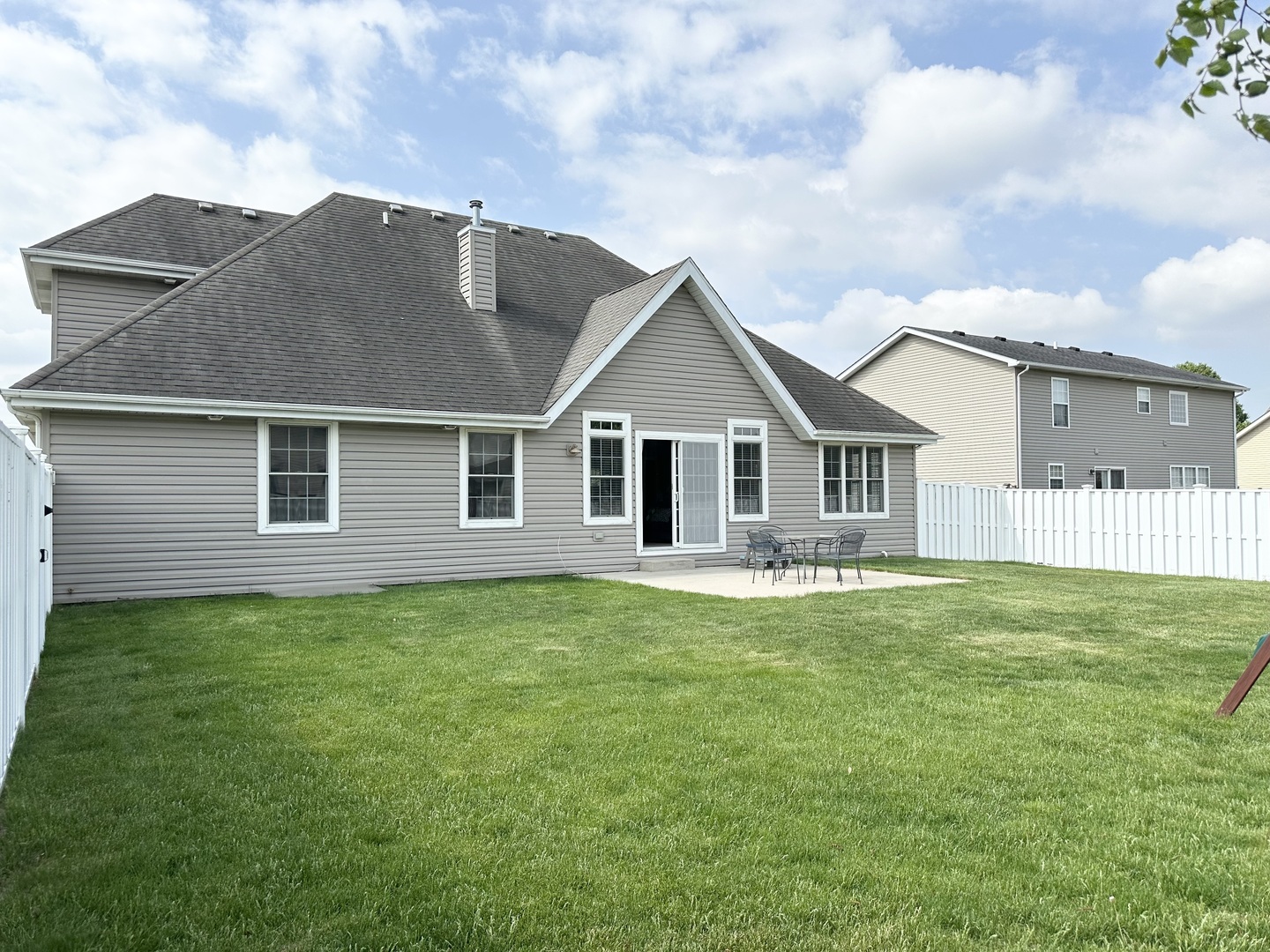 1205 Eagle Bluff Drive Bourbonnais, IL 60914 - Photo 49 of 51 a view of a house with a backyard