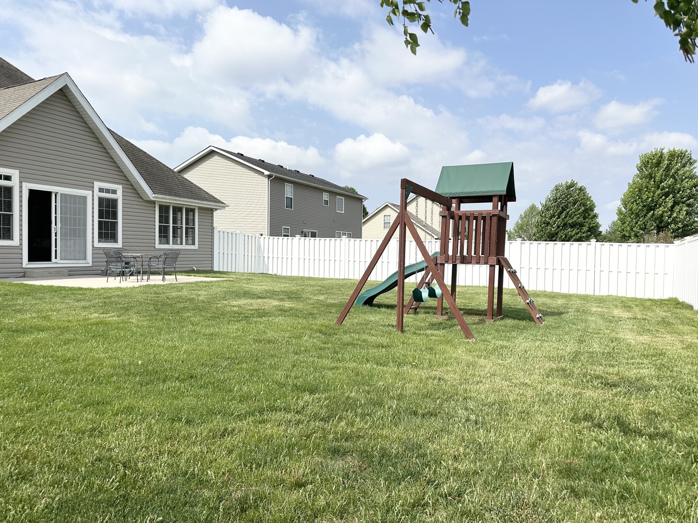 1205 Eagle Bluff Drive Bourbonnais, IL 60914 - Photo 50 of 51 a view of a house with a backyard