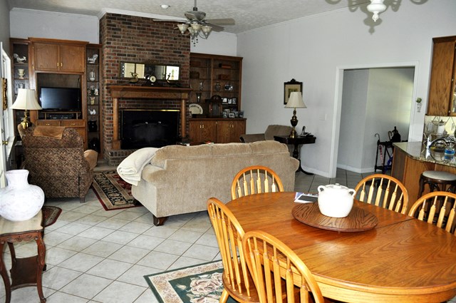 62 McCarthy Road Opelika, AL 36804 - Photo 23 of 35 a living room with furniture and a flat screen tv