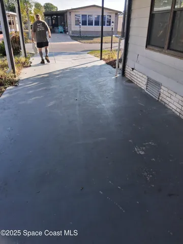 a view of a backyard with a garden