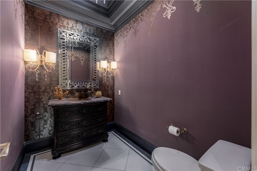 514 West Norman Avenue Arcadia, CA 91007 - Photo 21 of 69 a bathroom with a toilet sink and mirror