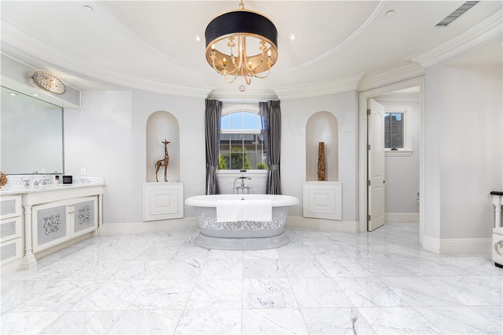 514 West Norman Avenue Arcadia, CA 91007 - Photo 46 of 69 a spacious bathroom with a double vanity sink a mirror and a bathtub